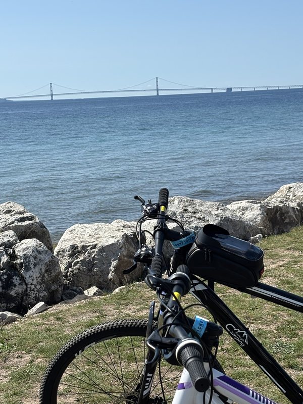 Bicycle overlooking the Mackinac Bridge from Mackinac Island