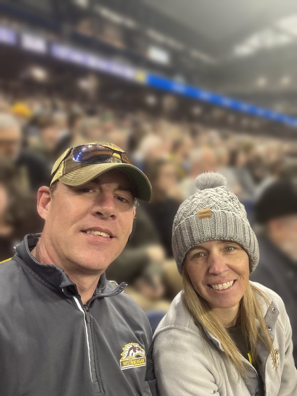 Keith Rockhill and his wife at a Western Michigan football game at Ford Field
